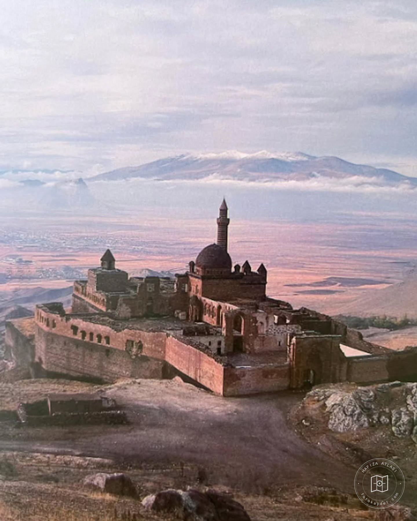 A palace in a mountainous landscape
