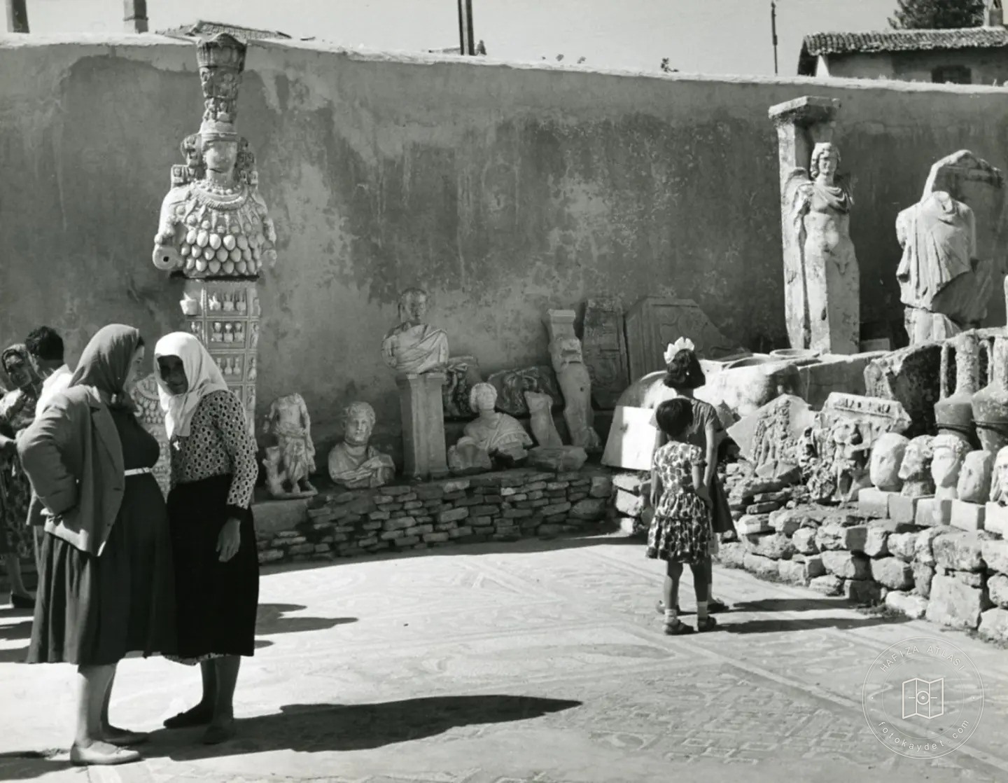The statue of Artemis and women in the Ephesus Museum courtyard, 1962