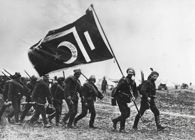 Turkish troops following a standard-bearer, around 1917