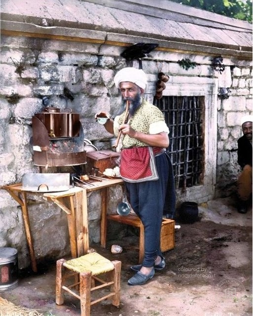 A coffee seller beside a wall, 1880–1890