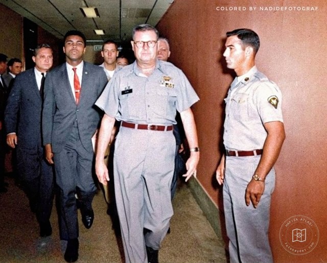 Muhammad Ali leaving court, 1967