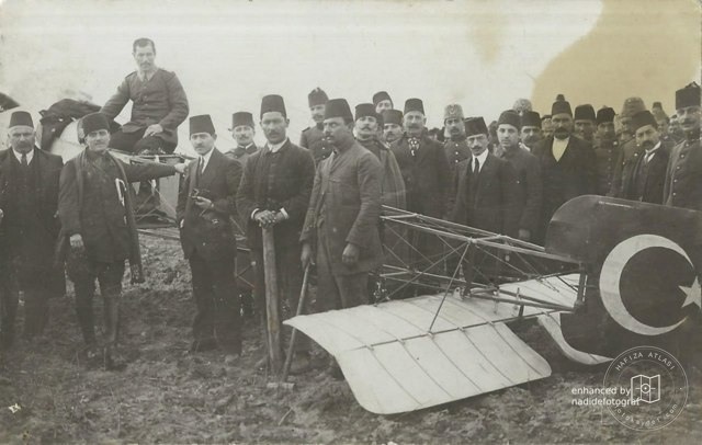 Officers and civilians around a crashed Ottoman aircraft