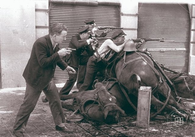 Soldiers behind a barricade in Barcelona, 1936