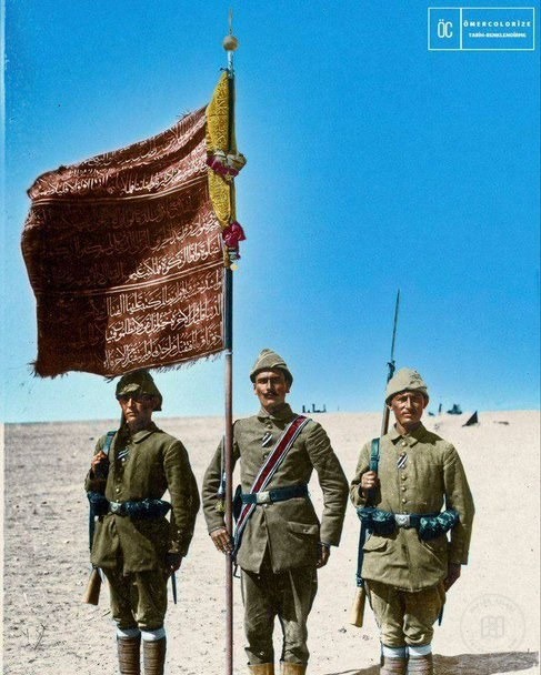 Ottoman soldiers carrying a regimental standard in Gaza, 1917