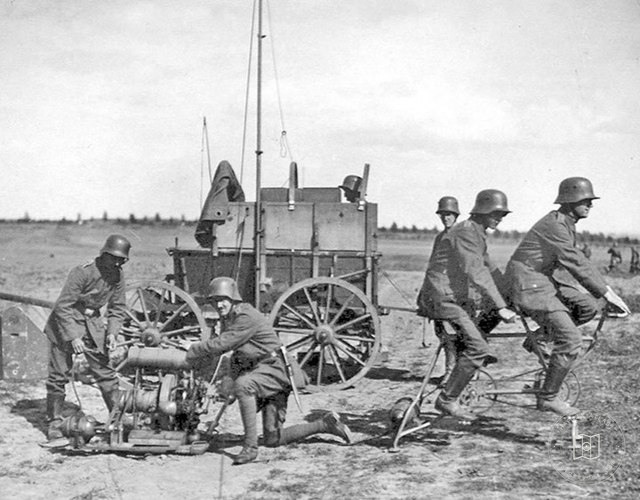 German soldiers generating electricity for a field radio