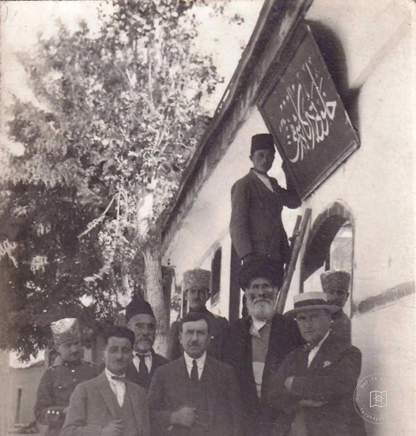 A Halveti lodge's sign being removed