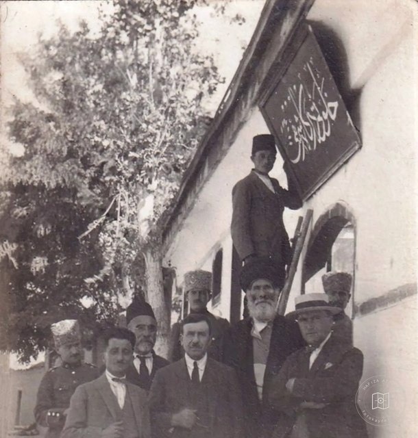 A Halveti lodge's sign being removed
