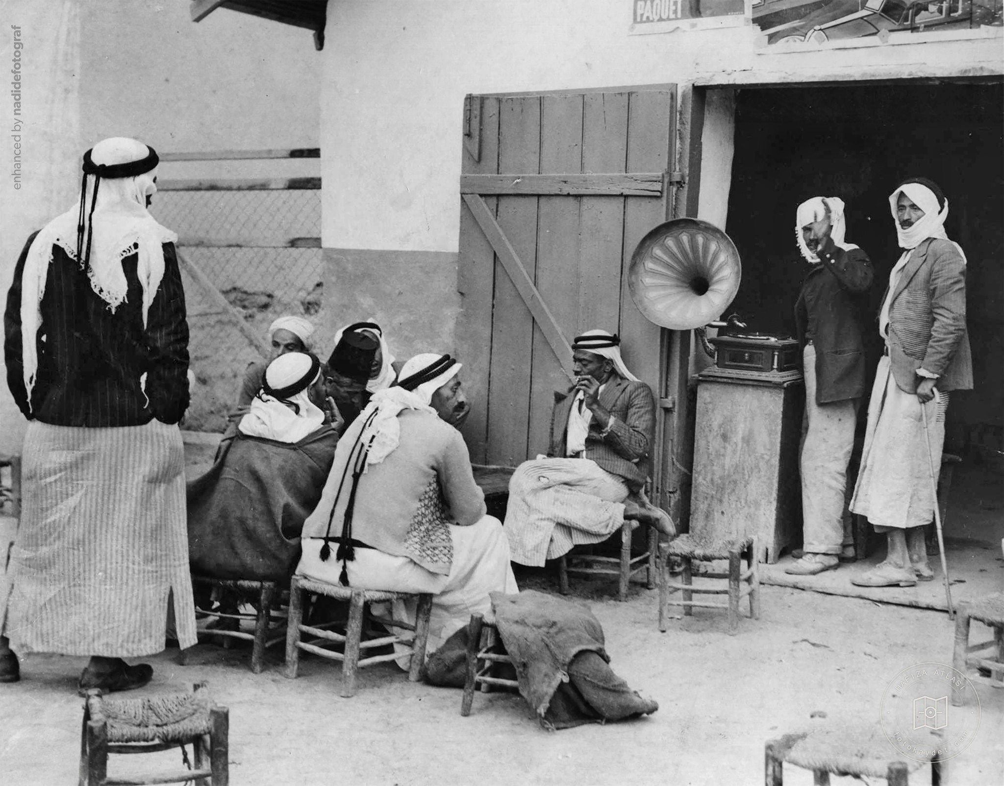 People listening to a gramophone in a Jerusalem coffeehouse, 1938