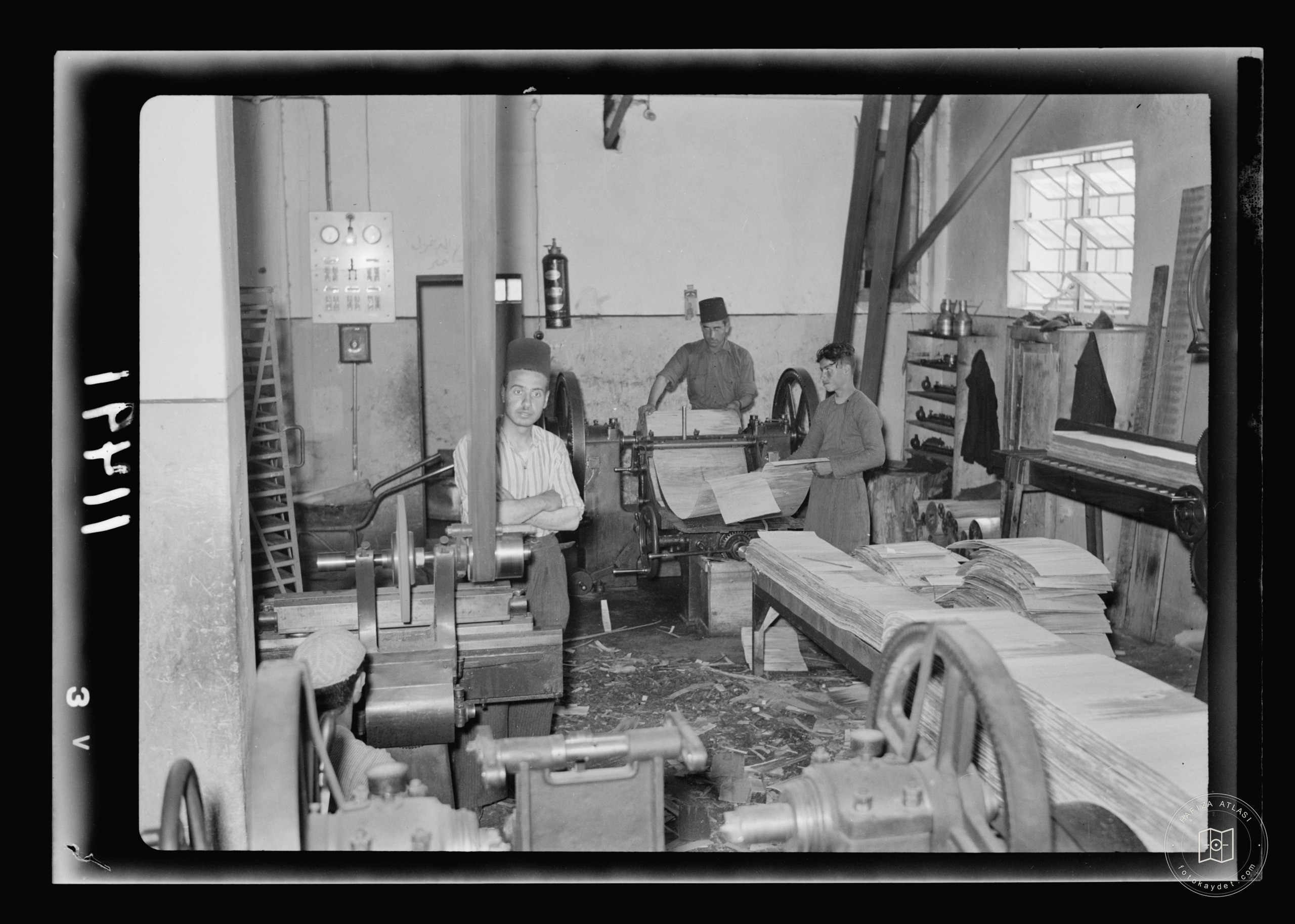Match factory. Cutting of logs on lathe into strips, Nablus
