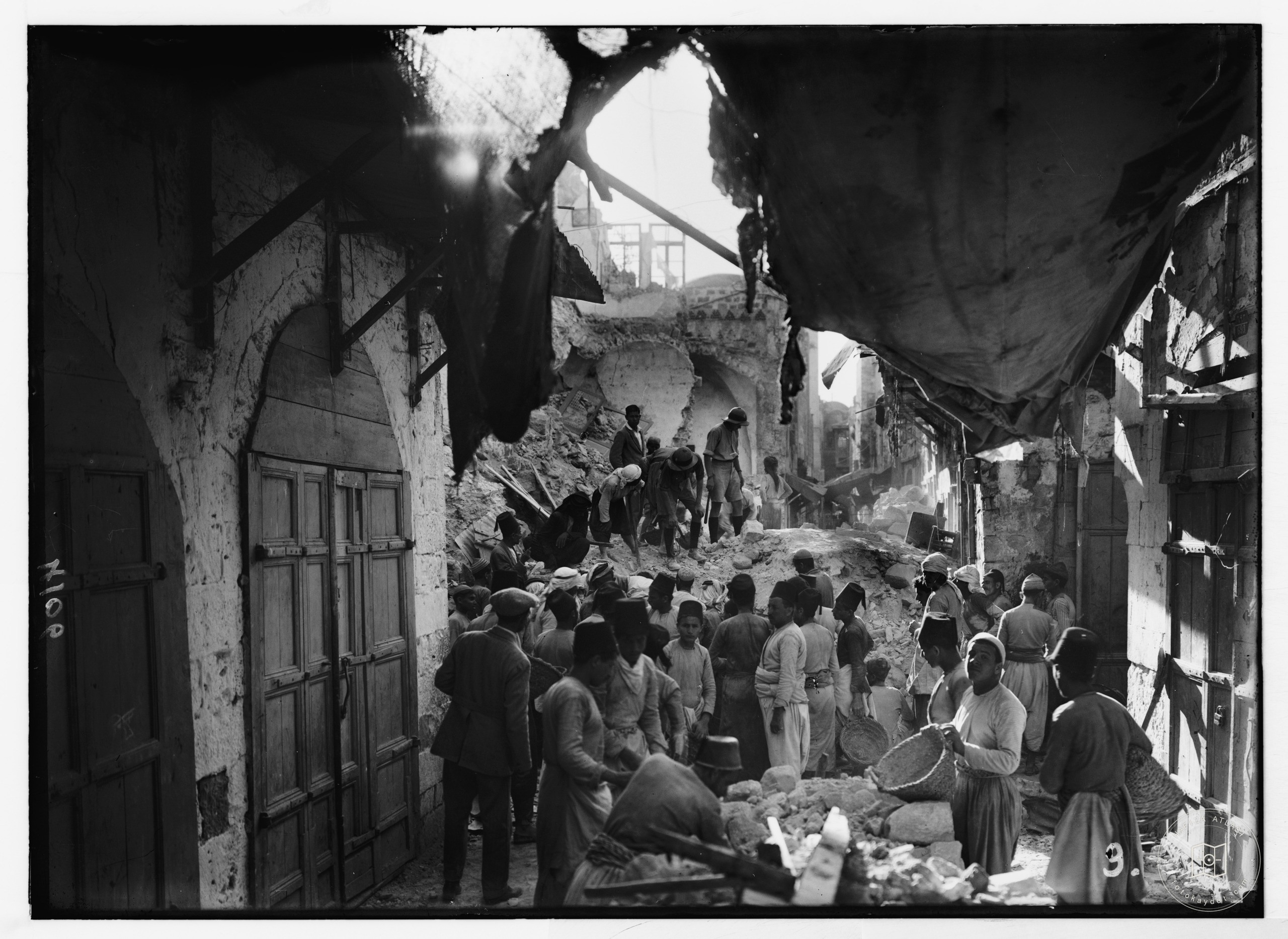 People in the market after the earthquake, Nablus