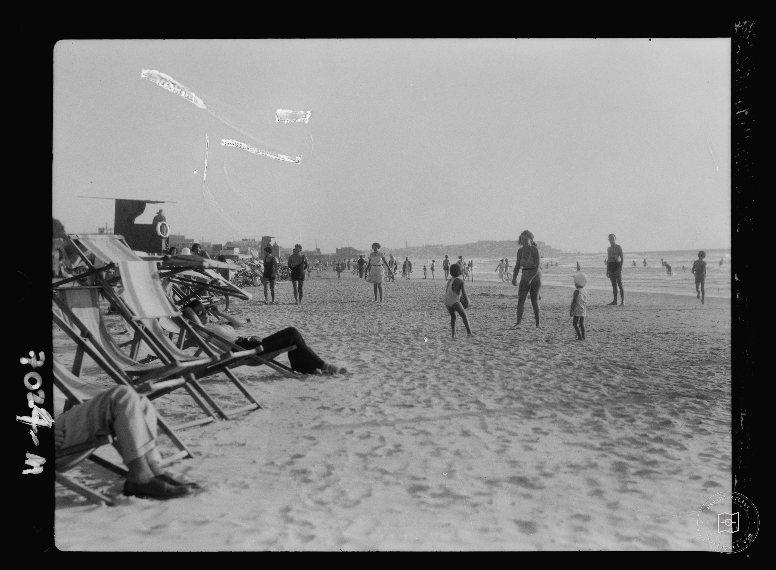 People relaxing on the beach, Jaffa