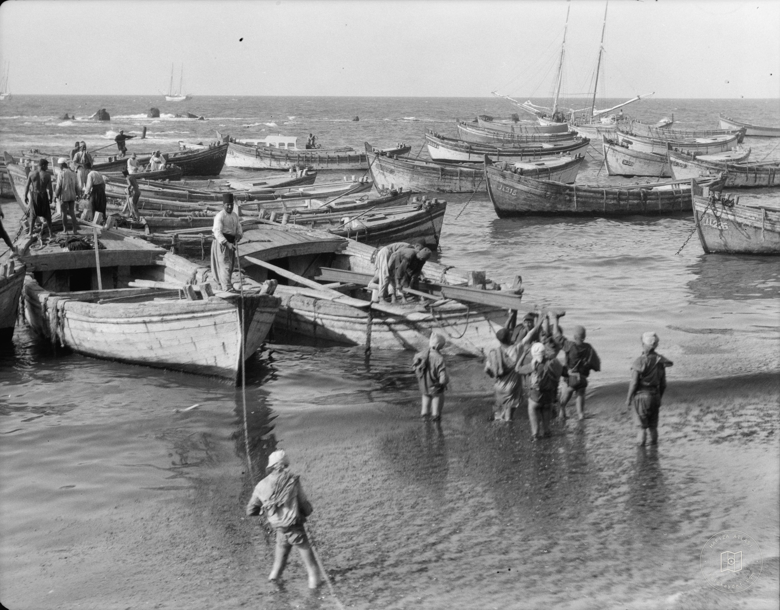 Boats and people along the shore, Jaffa