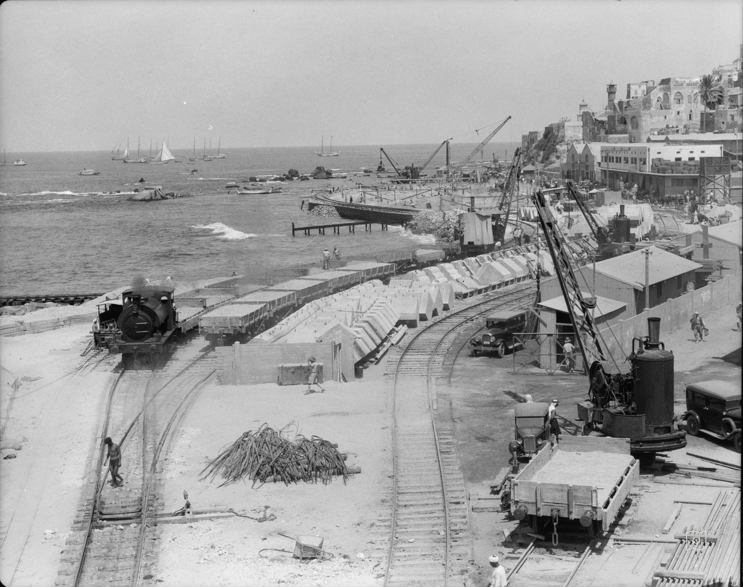 Construction of Jaffa pier. Construction work on Jaffa sea front. General view showing site of house of Simon the Tanner in upper right hand corner