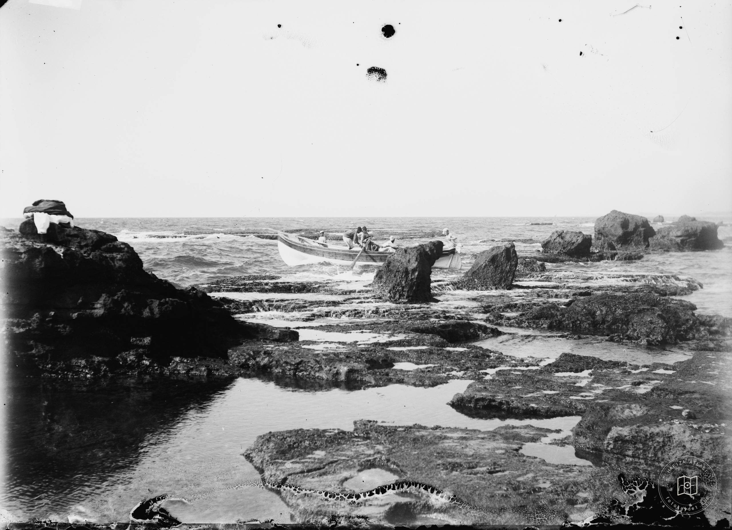 Jaffa (Joppa) and environs. Boat going through the rocks