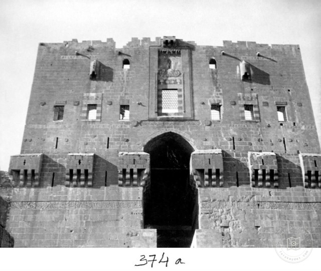 Aleppo — Citadel entrance — upper tower seen from the bridge
