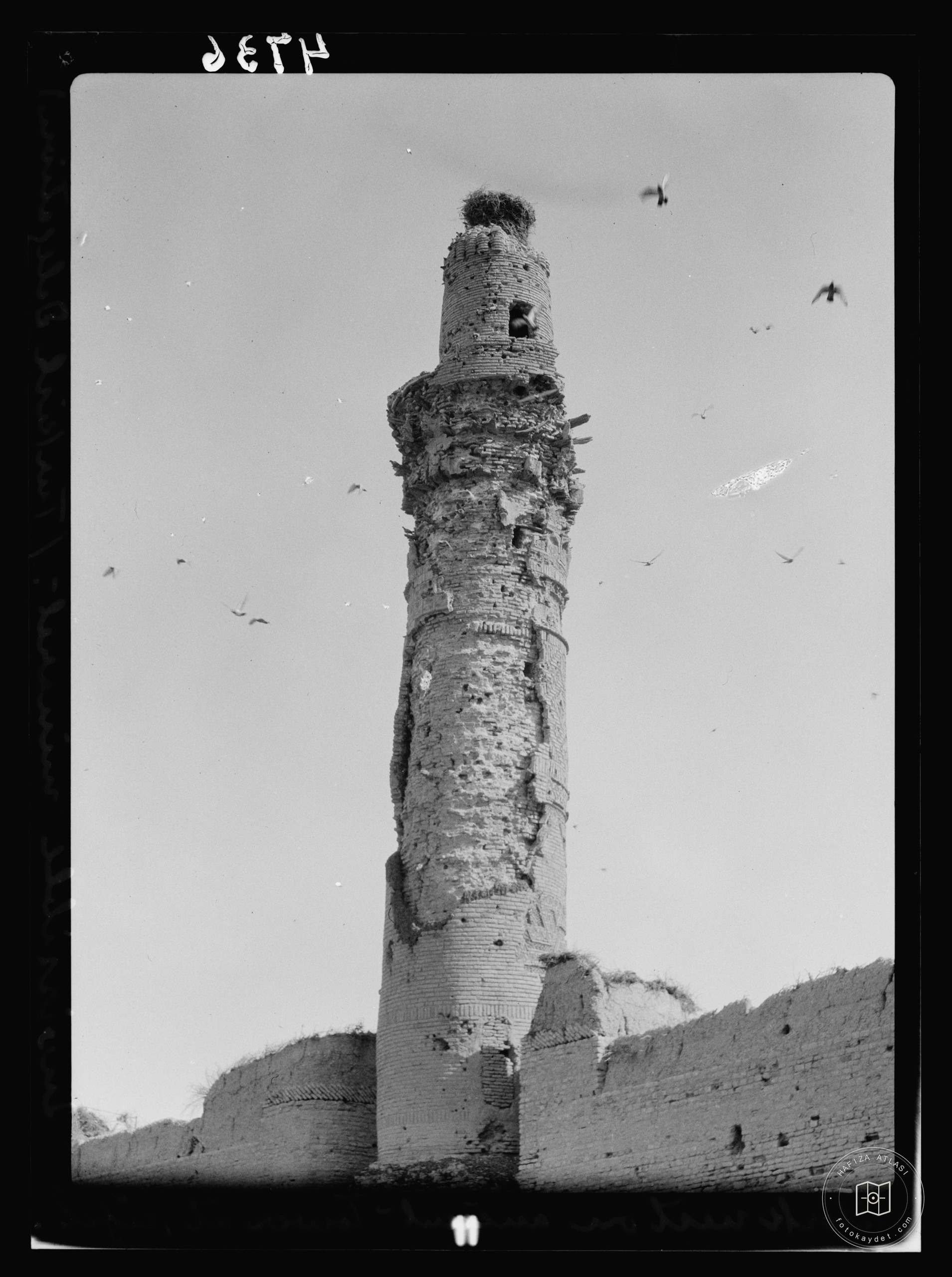 Kifl. Local Muslim village with a Jewish shrine to the prophet Ezekiel. Moslem minaret. Close to the Jewish shrine