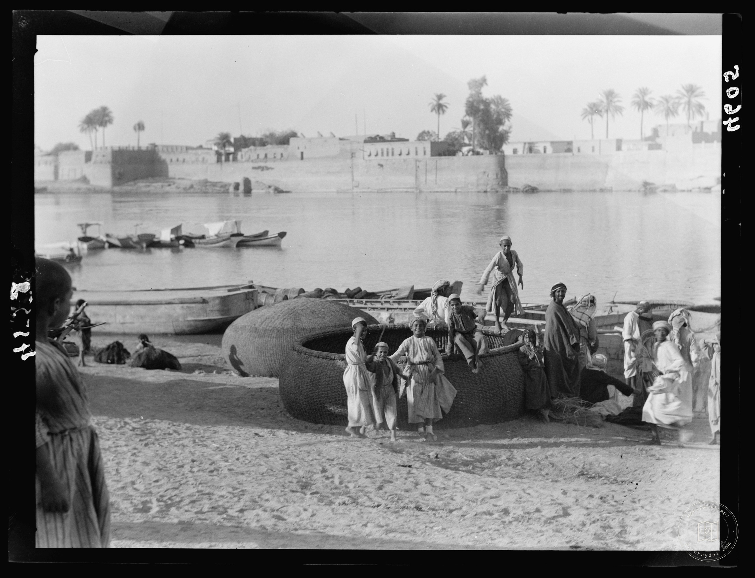 Baghdad. The Tigris. Ghuffas in dry dock for re-tarring