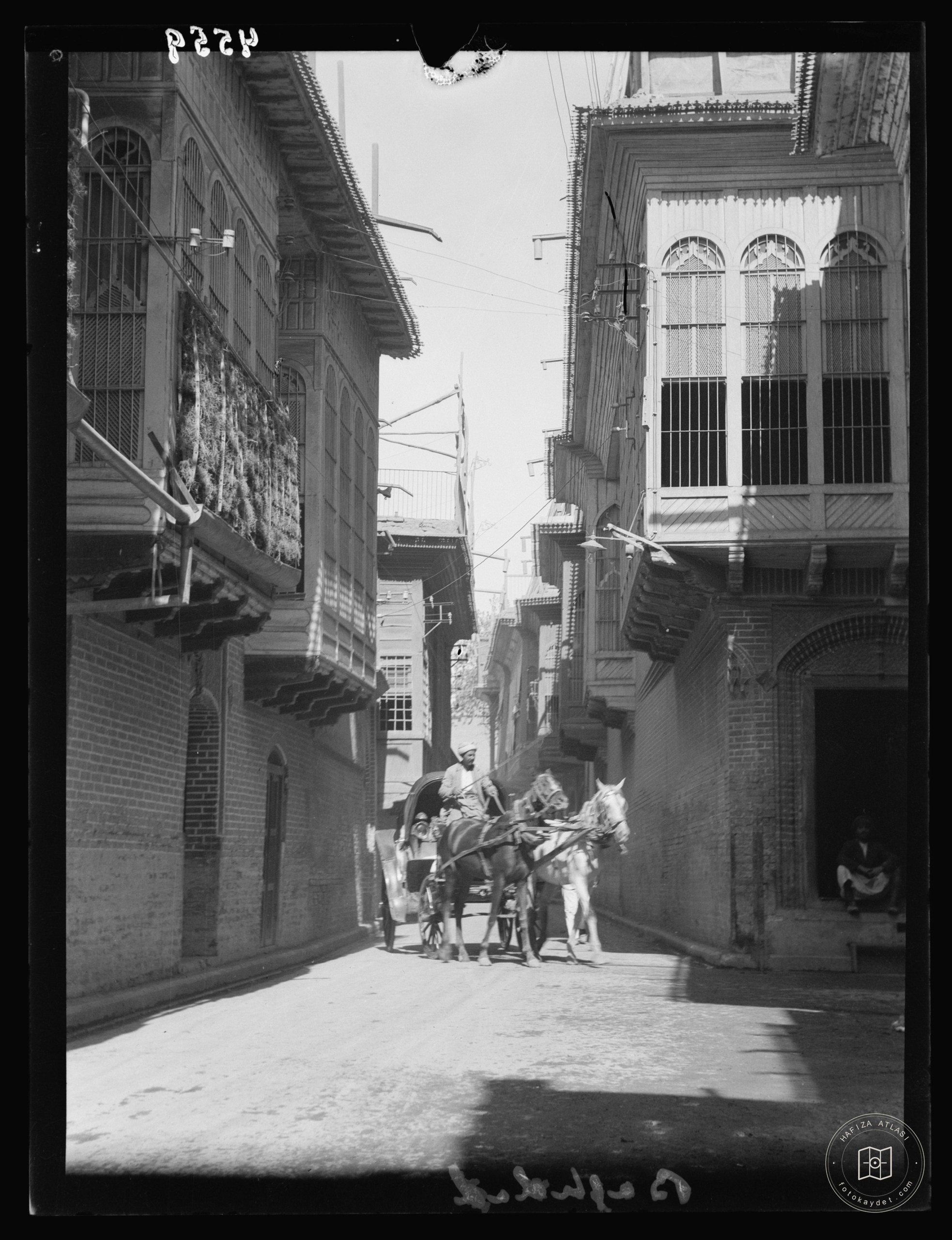 Baghdad. Street scene showing overhanging balconies