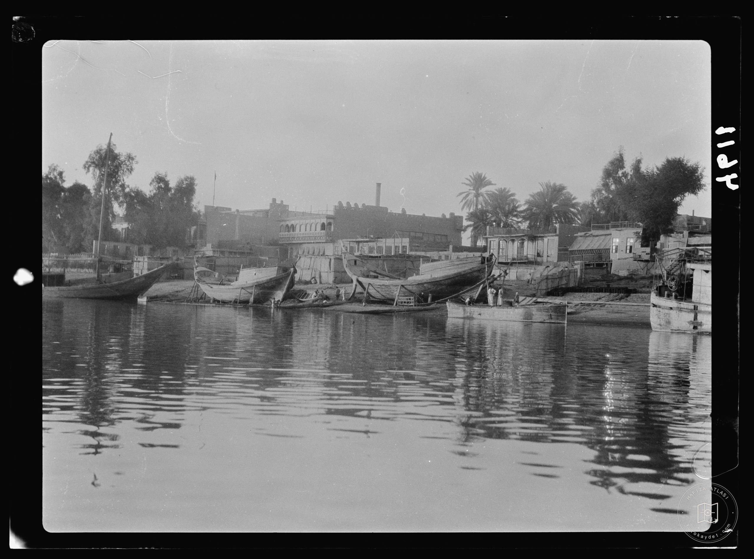 Baghdad. Tigris river scene showing the Serai and large river boats
