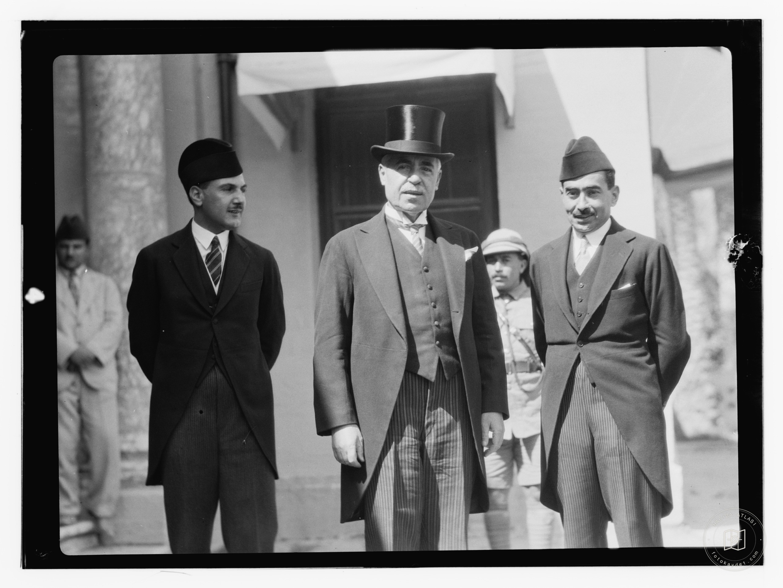 10/6/32 at the palace etc., Baghdad, man in tophat with men in tails