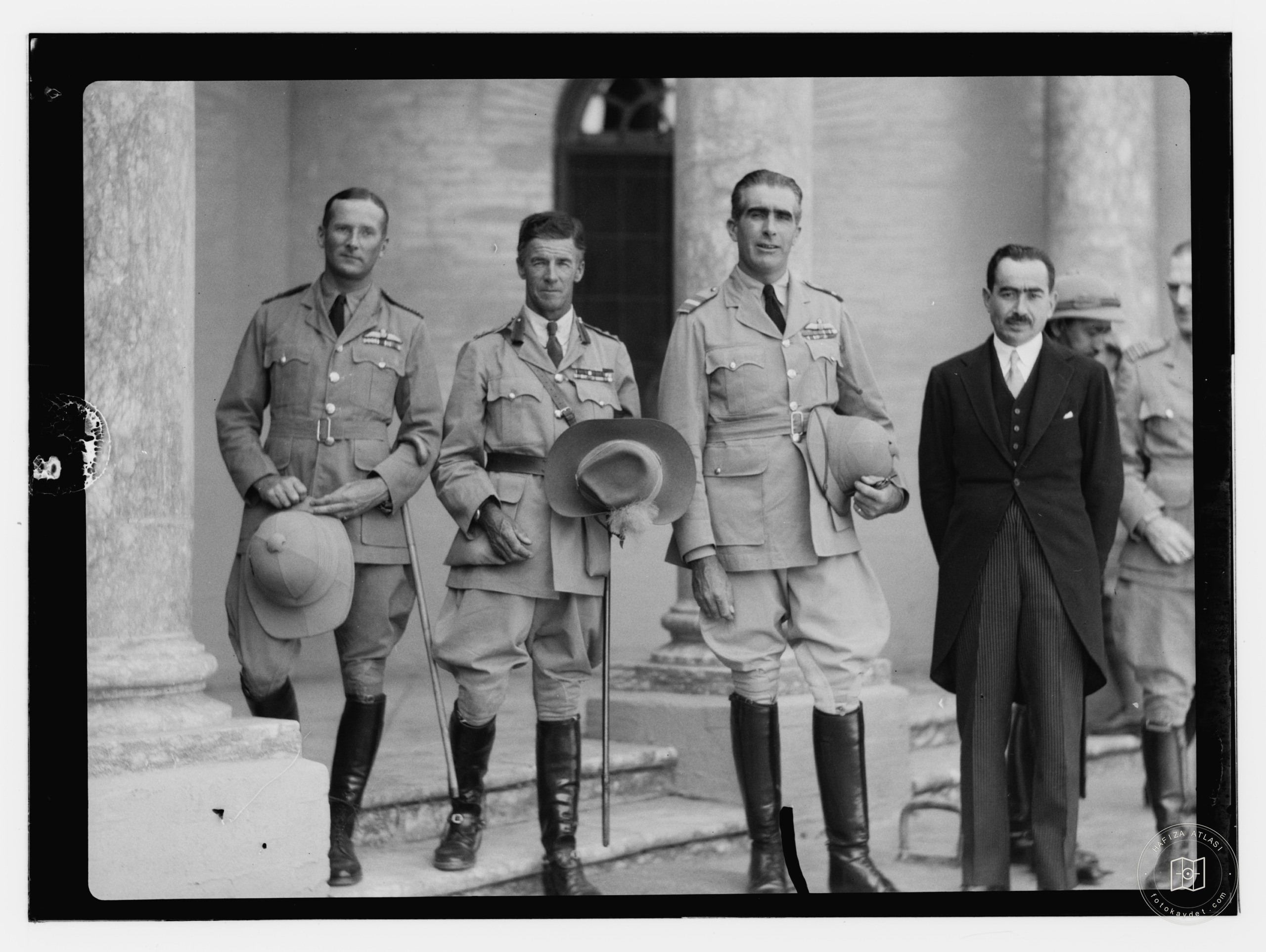 10/6/32 at palace etc., Baghdad. Two British R.A.F. and one Australian (?) officer. One man in tails