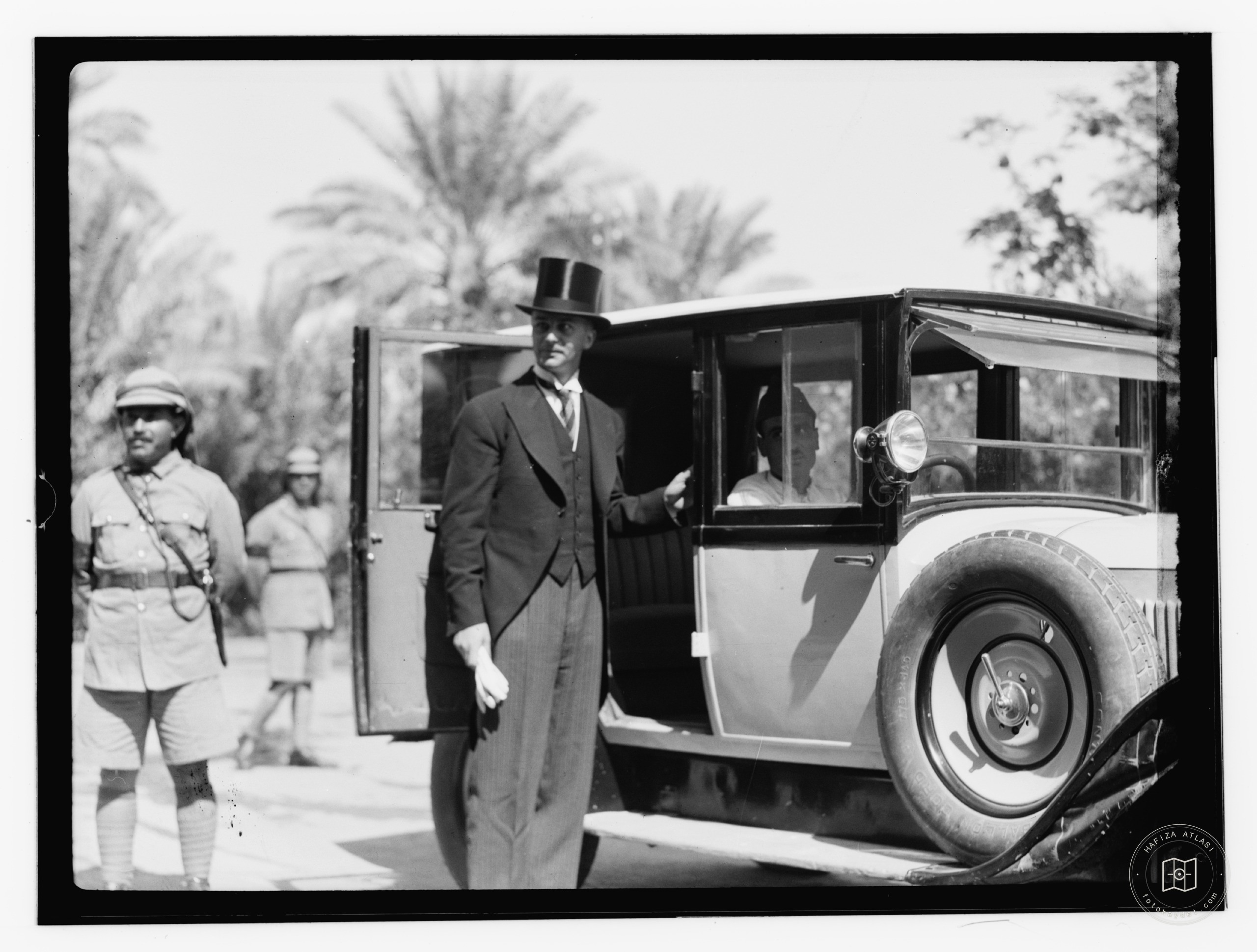 10/6/32 at the palace etc., Baghdad, man with top hat getting in car