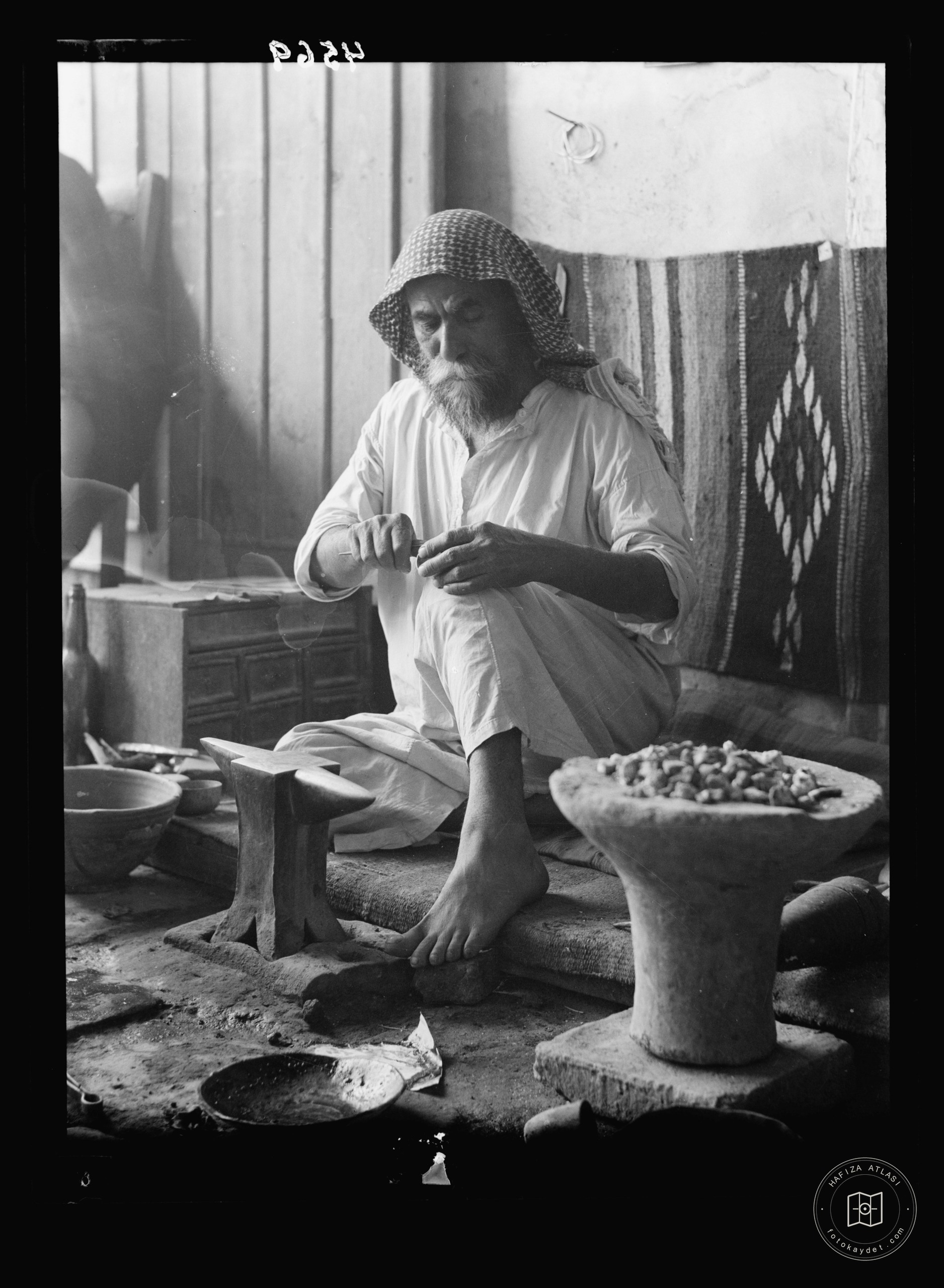Baghdad. A Sabean silversmith. At work in his jewelry store. A Sabean-sect who venerate John the Baptist