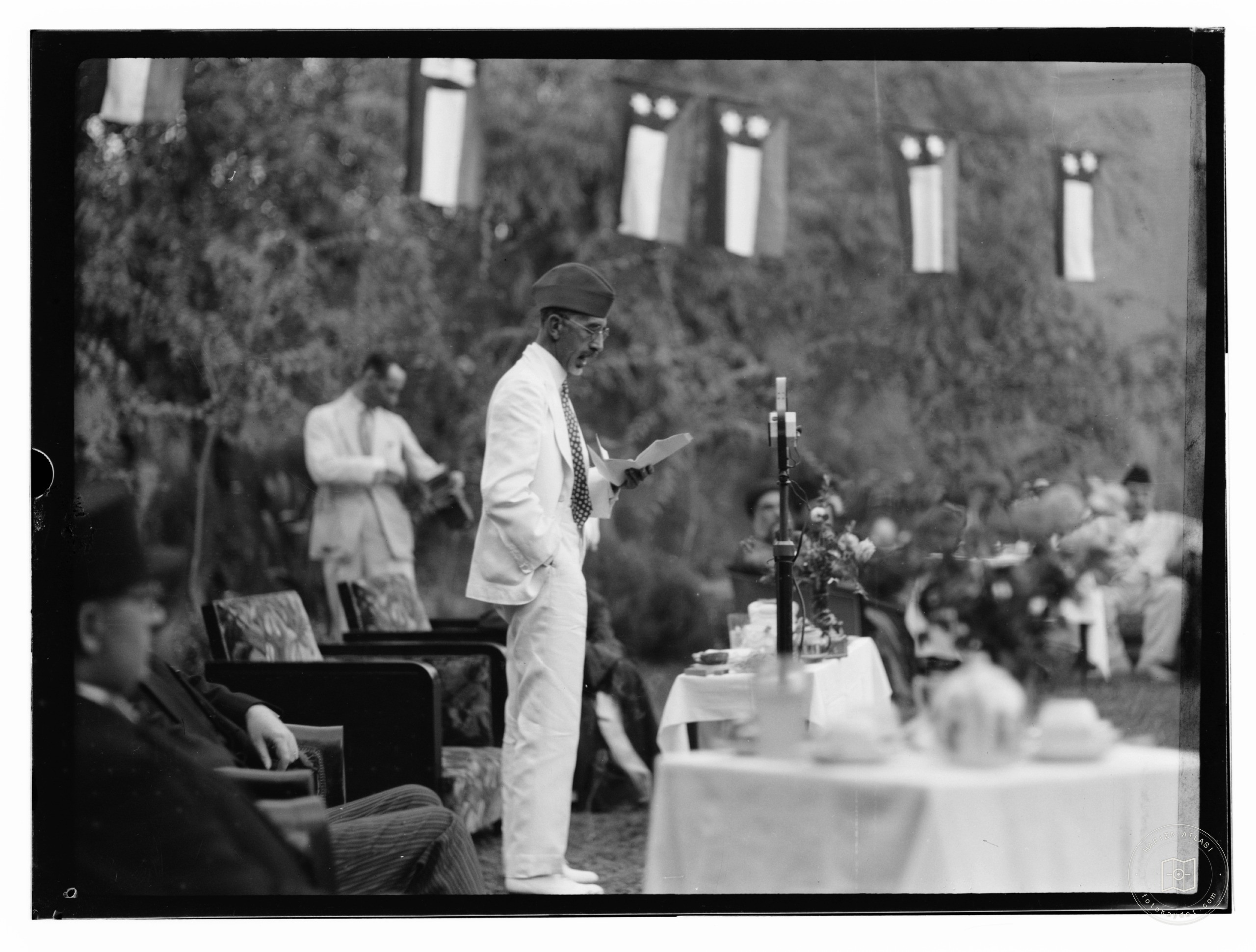 10/6/32 at the palace etc., Baghdad, man making a speech