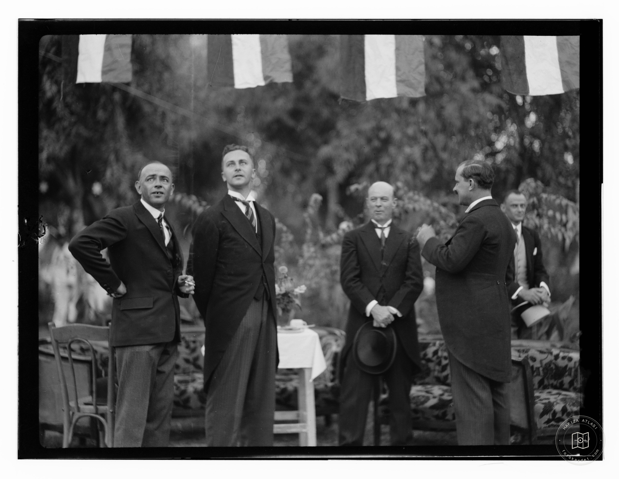 10/6/32 at the palace etc., Baghdad, 4 men, 3 in tails