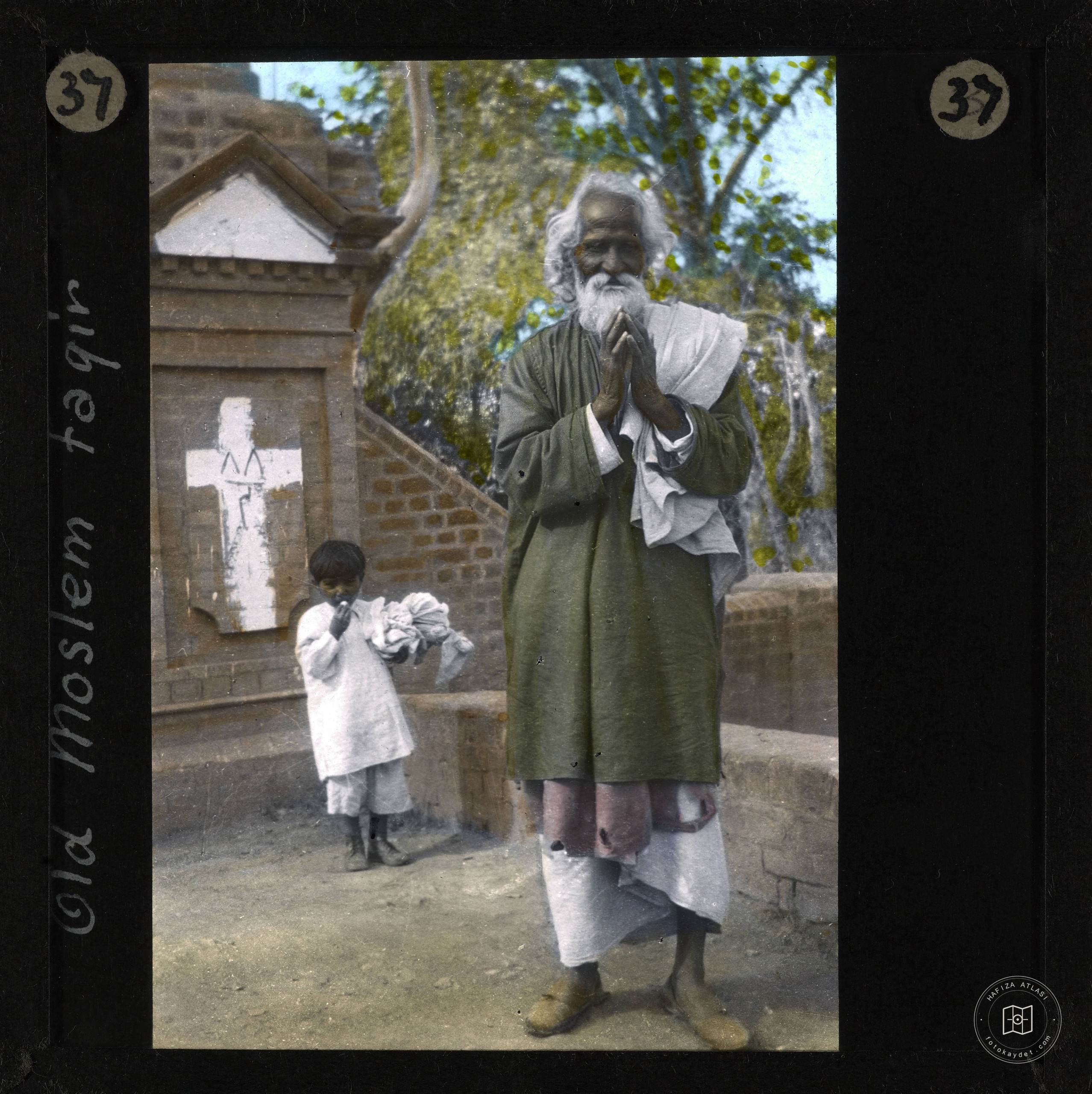 An elderly dervish and a child in Jammu
