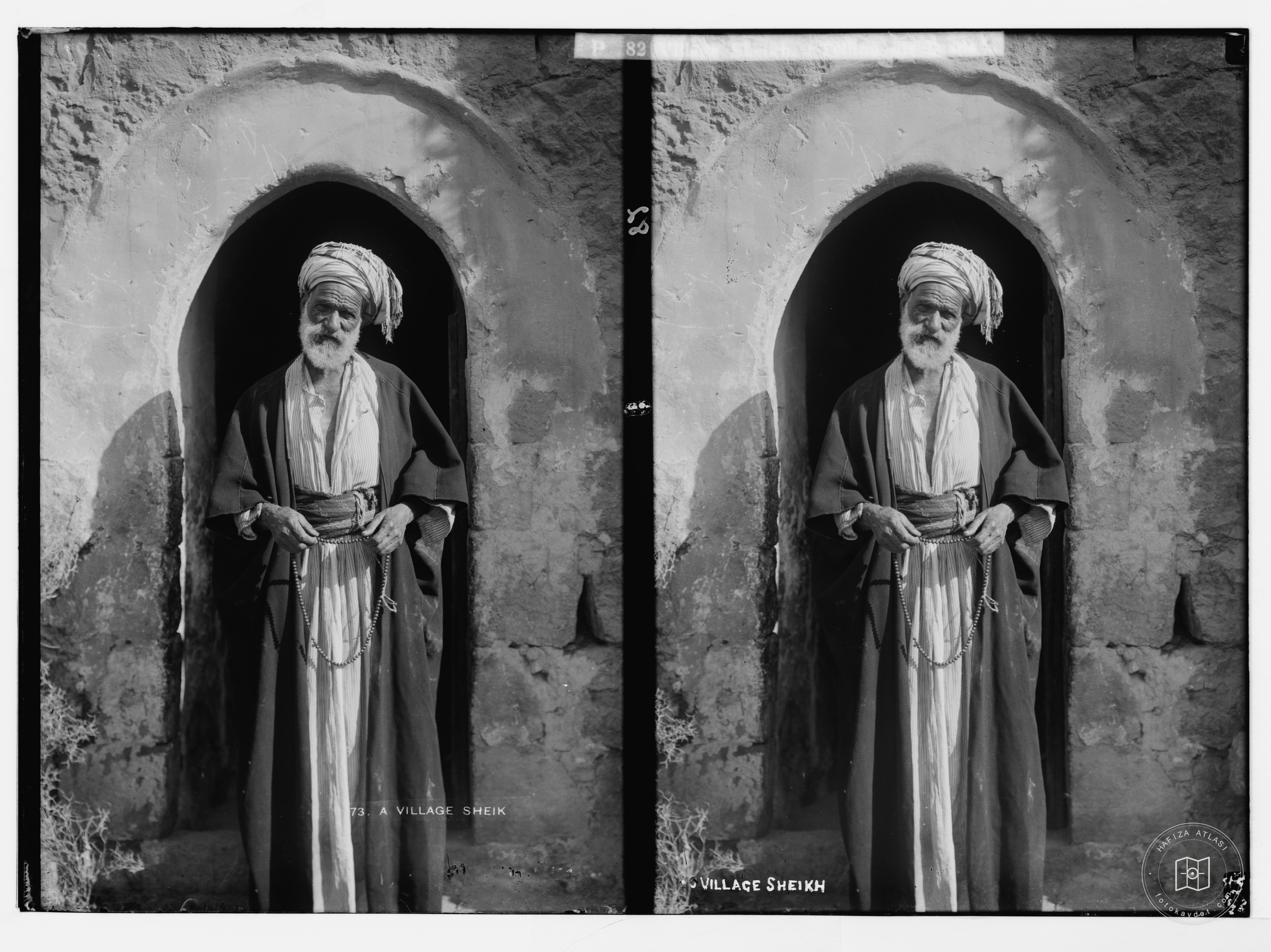 Village sheikh holding prayer beads