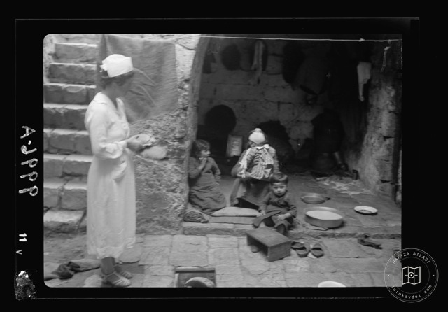 Aid distribution in a courtyard in Jerusalem