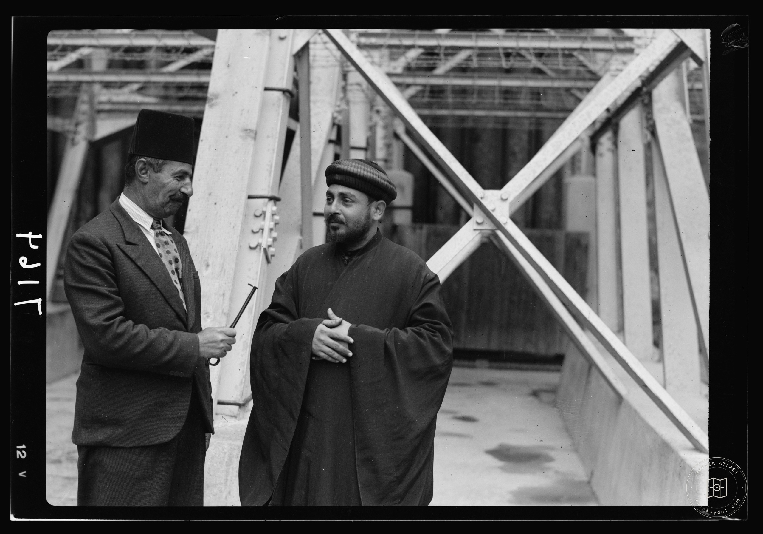 Muslim custodian and Coptic monk at the Holy Sepulchre