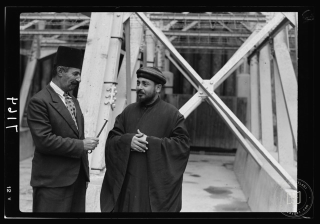 Muslim custodian and Coptic monk at the Holy Sepulchre
