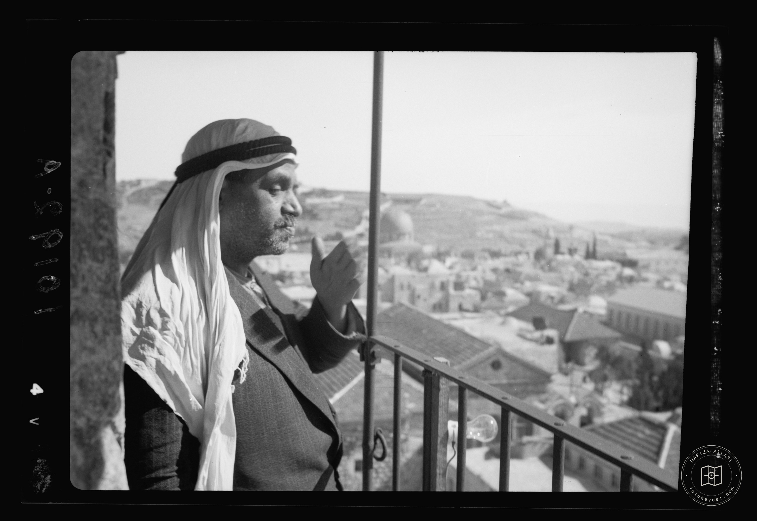 Muezzin on a minaret balcony in Jerusalem