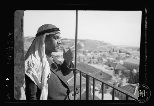 Muezzin on a minaret balcony in Jerusalem