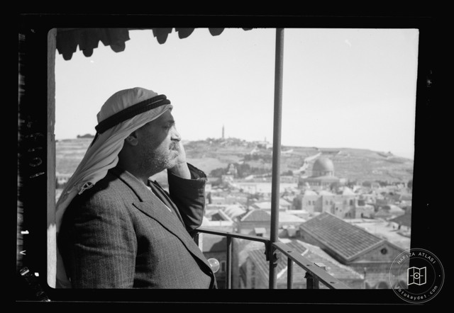 Muezzin calling to prayer from Saladin’s Minaret