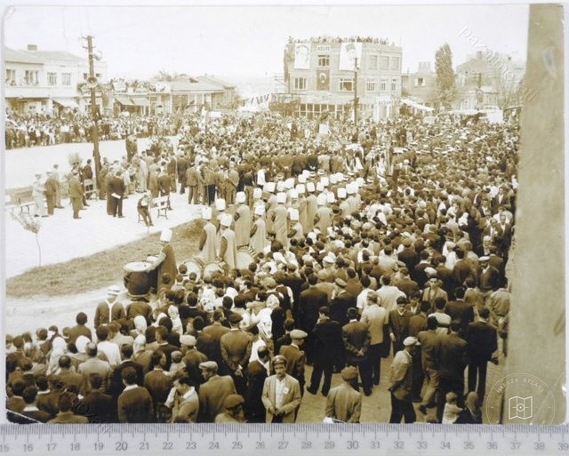 Crowd Gathered in a Square