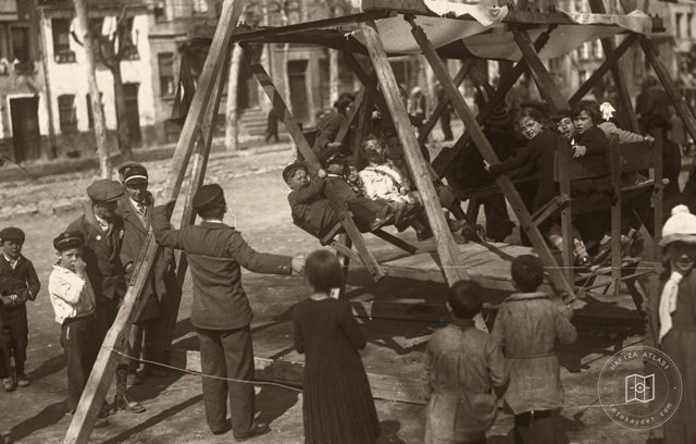 Children enjoying a traveling street swing in Istanbul
