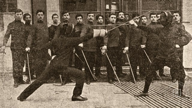 Physical Education School students practicing fencing