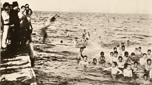 Naval Academy students practicing swimming