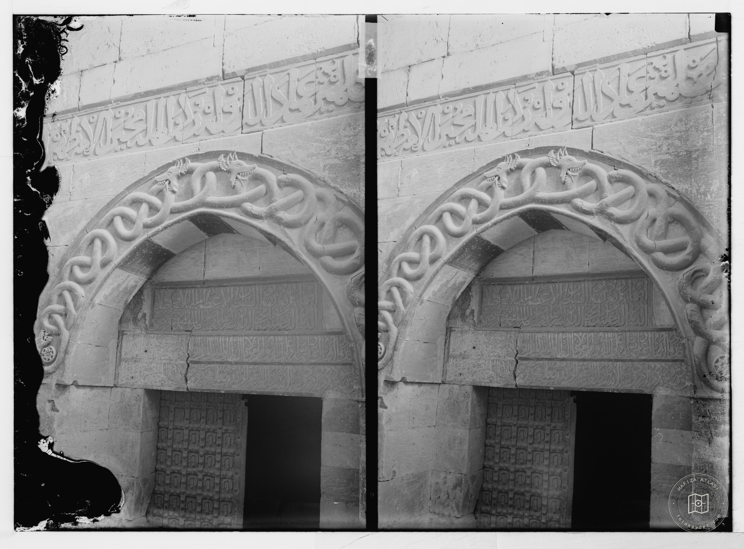 Aleppo (Haleb) and environs. Entwined serpents over gateway to castle
