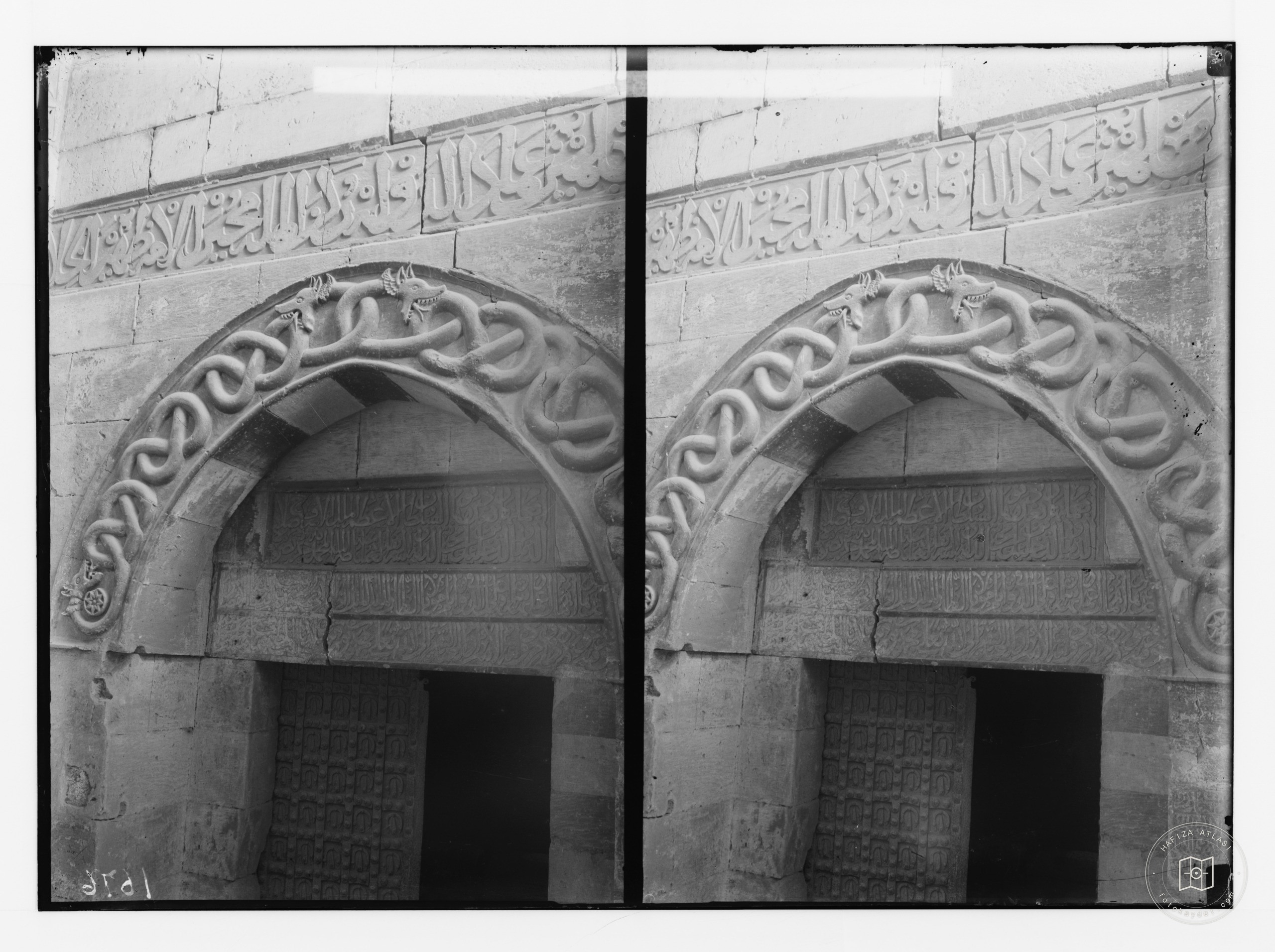 Aleppo (Haleb) and environs. Entwined serpents over gateway to castle