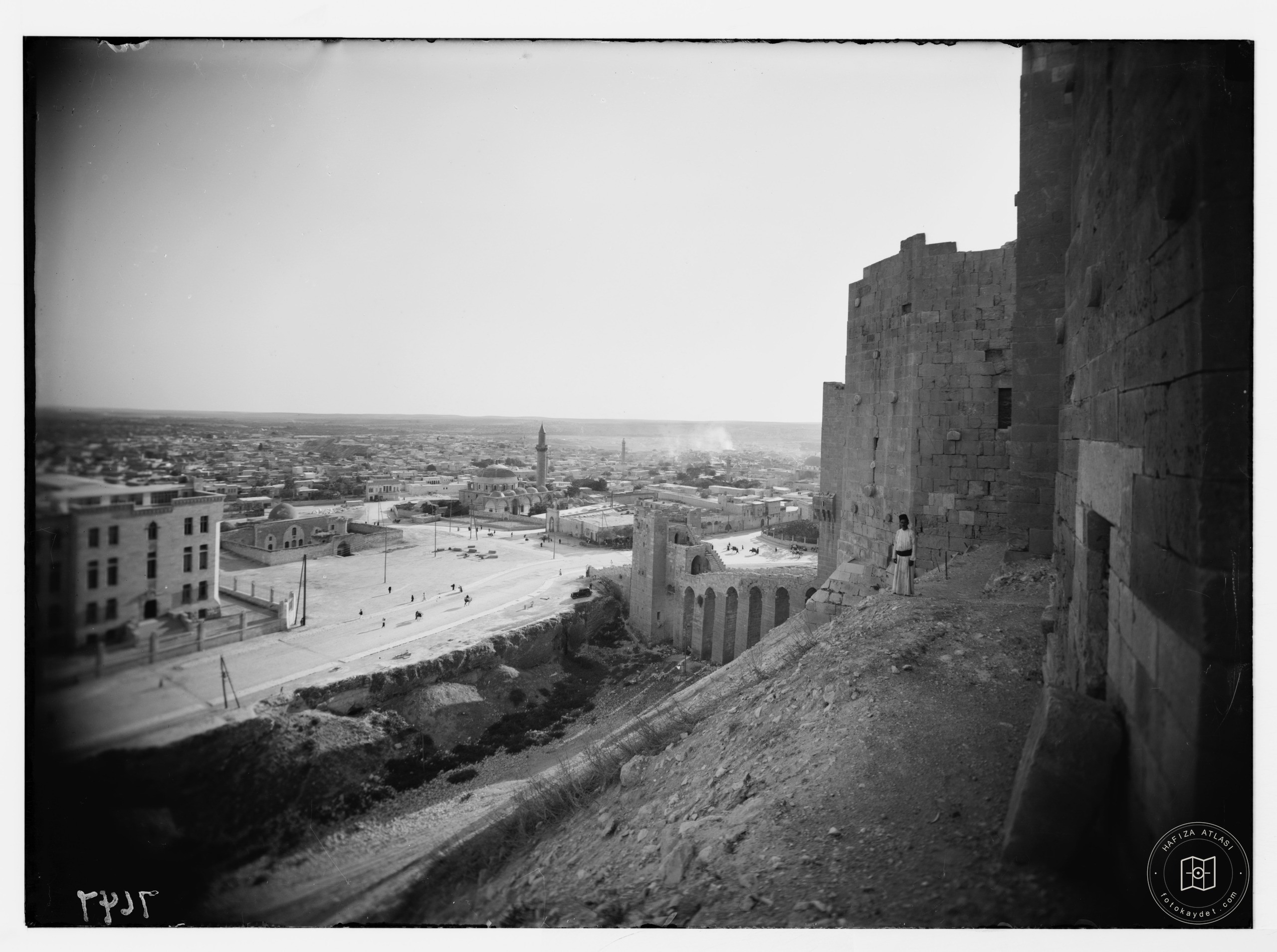 Aleppo from the castle showing moat & entrance