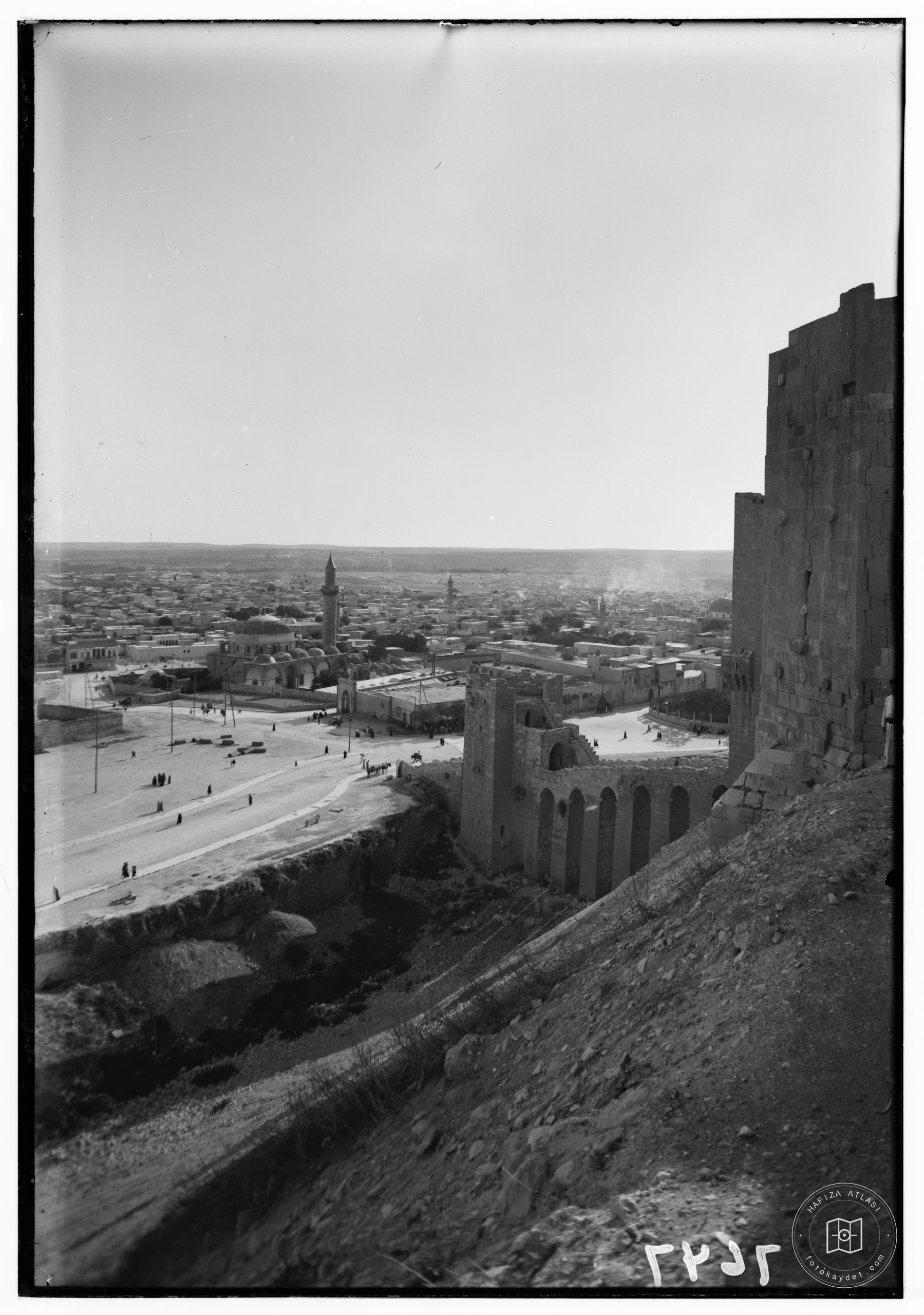 Aleppo from the castle showing moat & entrance