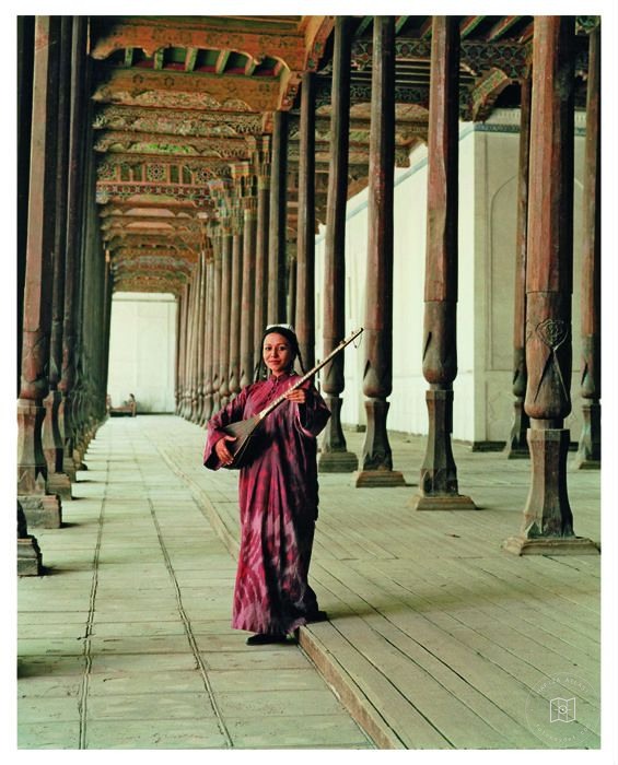 Portrait of Nodira Pirmatova inside the mosque