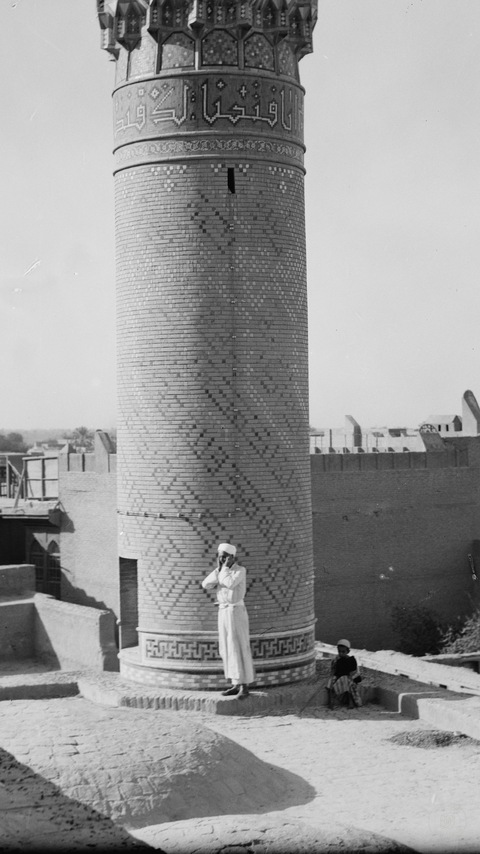 Baghdad. Lower section of the Haidar Khana Mosque. Muezzin calling to prayer