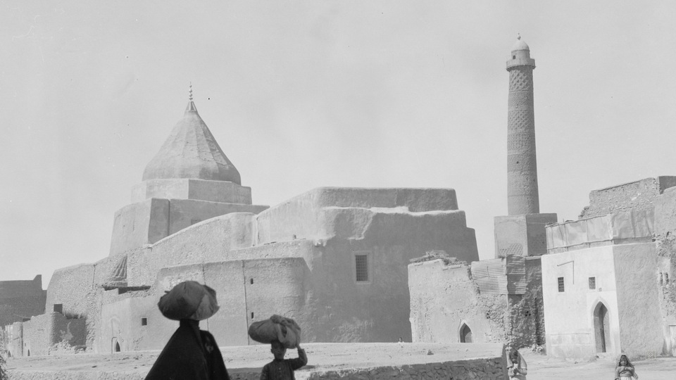 Mosul. In the heart of ancient Mosul, showing a Yezidi shrine to the left