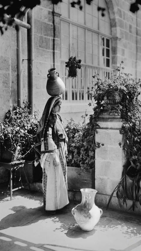Woman from Ramallah carrying a water vessel, AaUppercase