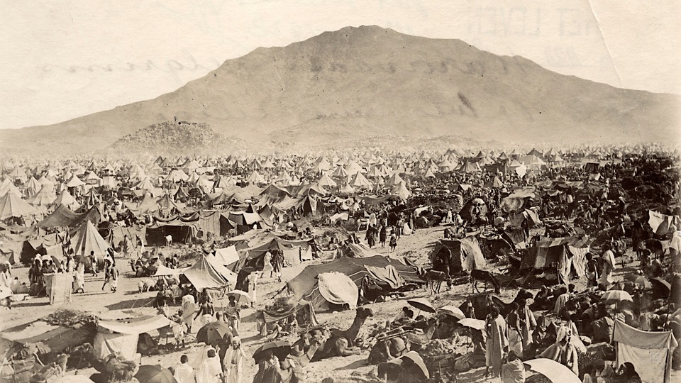 Pilgrims at the foot of the Mount of Mercy at Arafat